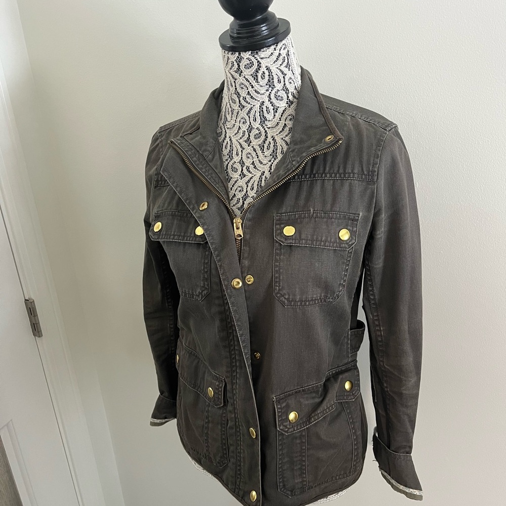 Women's faded army green utility jacket with gold accents